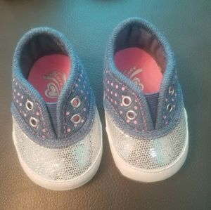 Children place sneakers